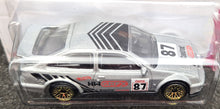 Load image into Gallery viewer, Hot Wheels Hot Wheels 2023 &#39;87 Ford Sierra Cosworth Silver #2 HW: The 80s 1/10 New Long Card
