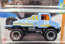 Load image into Gallery viewer, Hot Wheels 2023 Mercedes-Benz Unimog 1300L Light Blue #61 HW Haulers 4/5 New Long Card
