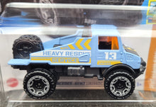 Load image into Gallery viewer, Hot Wheels 2023 Mercedes-Benz Unimog 1300L Light Blue #61 HW Haulers 4/5 New Long Card
