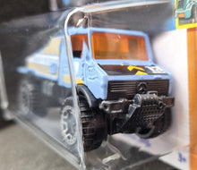 Load image into Gallery viewer, Hot Wheels 2023 Mercedes-Benz Unimog 1300L Light Blue #61 HW Haulers 4/5 New Long Card
