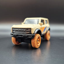 Load image into Gallery viewer, Hot Wheels 2023 &#39;21 Ford Bronco Tan HW Remote Adventures 5 Pack Exclusive
