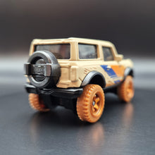 Load image into Gallery viewer, Hot Wheels 2023 &#39;21 Ford Bronco Tan HW Remote Adventures 5 Pack Exclusive
