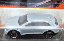 Load image into Gallery viewer, Matchbox 2023 Audi E-Tron Silver #1 MBX Metro 1/100 New Long Card
