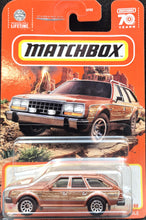 Load image into Gallery viewer, Matchbox 2023 1980 AMC Eagle Caramel #11 MBX Off-Road New Long Card
