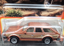 Load image into Gallery viewer, Matchbox 2023 1980 AMC Eagle Caramel #11 MBX Off-Road New Long Card
