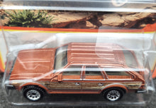 Load image into Gallery viewer, Matchbox 2023 1980 AMC Eagle Caramel #11 MBX Off-Road New Long Card
