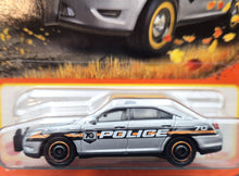 Load image into Gallery viewer, Matchbox 2023 Ford Police Interceptor Silver MBX 70 Years Special Edition #23/100 New
