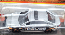 Load image into Gallery viewer, Matchbox 2023 Ford Police Interceptor Silver MBX 70 Years Special Edition #23/100 New
