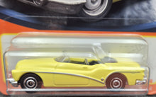 Load image into Gallery viewer, Matchbox 2023 1953 Buick Skylark Convertible Yellow #32 MBX Showroom New Long Card
