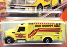 Load image into Gallery viewer, Matchbox 2023 International WorkStar Ambulance Yellow #38 MBX Metro Long Card
