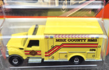 Load image into Gallery viewer, Matchbox 2023 International WorkStar Ambulance Yellow #38 MBX Metro Long Card
