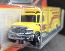 Load image into Gallery viewer, Matchbox 2023 International WorkStar Ambulance Yellow #38 MBX Metro Long Card
