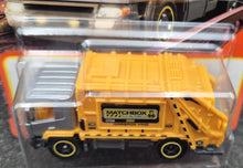 Load image into Gallery viewer, Matchbox 2023 Garbage King Grey/Yellow #61 MBX Metro New Long Card
