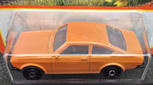 Load image into Gallery viewer, Matchbox 2023 1975 Opel Kadett Orange #73 MBX Highway New Long Card
