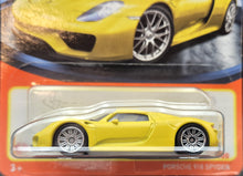 Load image into Gallery viewer, Matchbox 2023 Porsche 918 Spyder Yellow #77 MBX Showroom New Long Card
