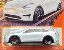 Load image into Gallery viewer, Matchbox 2023 Tesla Model Y Pearl White #89 MBX Metro New Long Card
