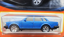 Load image into Gallery viewer, Matchbox 2023 1986 Volvo 240 Maroon Light Blue #99 MBX Showroom New Long Card
