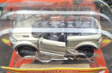 Load image into Gallery viewer, Matchbox 2023 Range Rover Evoque Convertible Champagne Moving Parts Series 21/54 New
