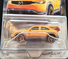 Load image into Gallery viewer, Matchbox 2023 2021 Mazda MX-30 Orange 70th Special Edition Moving Parts 4/5 New
