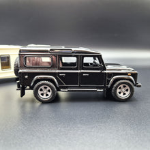 Load image into Gallery viewer, Explorafind 2012 Land Rover Defender with Caravan Black/Cream 1:32 Die Cast
