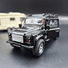 Load image into Gallery viewer, Explorafind 2012 Land Rover Defender with Caravan Black/Cream 1:32 Die Cast
