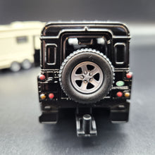 Load image into Gallery viewer, Explorafind 2012 Land Rover Defender with Caravan Black/Cream 1:32 Die Cast
