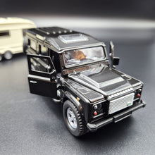 Load image into Gallery viewer, Explorafind 2012 Land Rover Defender with Caravan Black/Cream 1:32 Die Cast
