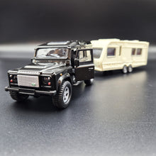 Load image into Gallery viewer, Explorafind 2012 Land Rover Defender with Caravan Black/Cream 1:32 Die Cast
