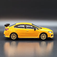 Load image into Gallery viewer, Explorafind 2016 Subaru WRX STI S207 Yellow 1:64 Die Cast Car
