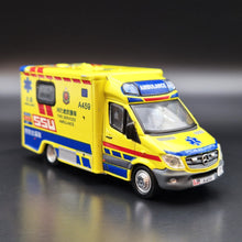 Load image into Gallery viewer, Explorafind 2019 Mercedes-Benz Sprinter FL SSU Fire Services Ambulance 1:64 Die Cast New
