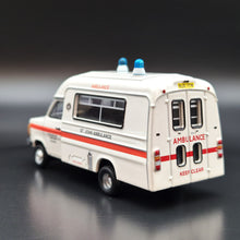 Load image into Gallery viewer, Explorafind 1980 Ford Transit MKII UK St. John Ambulance White 1:76 Die Cast New
