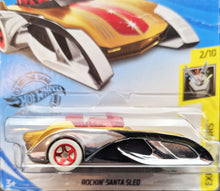 Load image into Gallery viewer, Hot Wheels 2020 Rockin Santa Sled Gold #53 Experimotors 2/10 New Long Card
