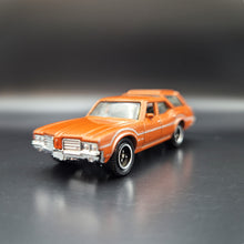 Load image into Gallery viewer, Matchbox 2010 Oldsmobile Vista Cruiser Orange Camping Adventure 5 Pack Exclusive
