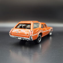 Load image into Gallery viewer, Matchbox 2010 Oldsmobile Vista Cruiser Orange Camping Adventure 5 Pack Exclusive
