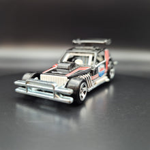 Load image into Gallery viewer, Hot Wheels 2011 Greased Gremlin Black #137 HW Performance 7/10
