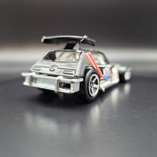 Load image into Gallery viewer, Hot Wheels 2011 Greased Gremlin Black #137 HW Performance 7/10
