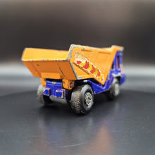 Load image into Gallery viewer, Matchbox 1976 Atlas Dump Truck Blue/Orange #23 Superfast
