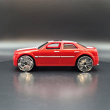 Load image into Gallery viewer, Hot Wheels 2009 Chrysler 300C Hemi Dark Orange #61 Track Stars 7/12
