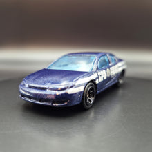 Load image into Gallery viewer, Hot Wheels 2007 Saturn Ion Quad Coupe Dark Blue Gotham City Pack Loose
