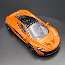 Load image into Gallery viewer, Rastar 2015 McLaren P1 Orange 1:43 Diecast Model Car
