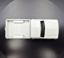 Load image into Gallery viewer, ERTL 1990 Ford F-150 Pickup White CAT Caterpillar Series
