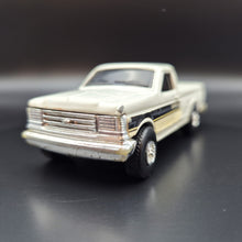 Load image into Gallery viewer, ERTL 1990 Ford F-150 Pickup White CAT Caterpillar Series
