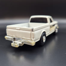 Load image into Gallery viewer, ERTL 1990 Ford F-150 Pickup White CAT Caterpillar Series
