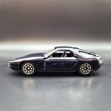 Load image into Gallery viewer, Welly 1982 Porsche 928 Dark Blue/Black #110 1:64 Car
