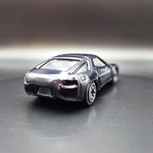 Load image into Gallery viewer, Welly 1982 Porsche 928 Dark Blue/Black #110 1:64 Car
