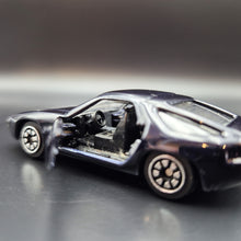 Load image into Gallery viewer, Welly 1982 Porsche 928 Dark Blue/Black #110 1:64 Car
