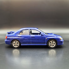 Load image into Gallery viewer, Welly 2002 Subaru Impreza WRX STI Blue #52241 1:60
