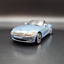 Load image into Gallery viewer, Suntoys BMW Z4 Light Blue L9833 1:64 Car
