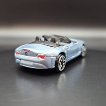 Load image into Gallery viewer, Suntoys BMW Z4 Light Blue L9833 1:64 Car
