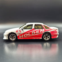 Load image into Gallery viewer, Matchbox 2000 Holden Commodore White/Red #11 1-75 Series
